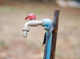 water drop in tap,Leaking water photo