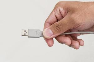 hand holding USB cable hub photo