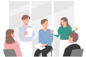 Office workers sitting around and discussing opinions with papers in hand. flat design style vector illustration.