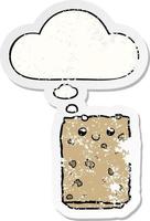 cartoon biscuit and thought bubble as a distressed worn sticker vector