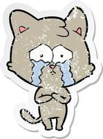 distressed sticker of a cartoon crying cat vector