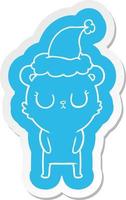 peaceful cartoon  sticker of a bear wearing santa hat vector