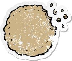 distressed sticker of a cartoon cookie vector