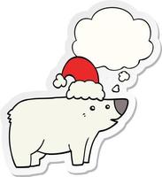 cartoon bear wearing christmas hat and thought bubble as a printed sticker vector