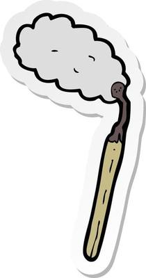 sticker of a cartoon burnt match
