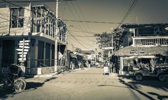 Holbox Quintana Roo Mexico 2021 Colorful Holbox island village with stores mud and people Mexico. photo