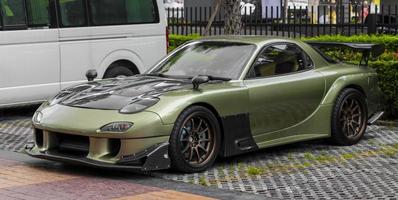 Huai Khwang Bangkok Thailand 2018 Green tuned sports car parked in Bangkok Thailand. photo