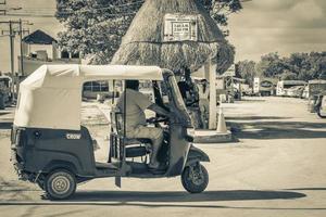 Chiquila Quintana Roo Mexico 2021 Blue auto rickshaw tuk tuk Puerto de Chiquila in Mexico. photo