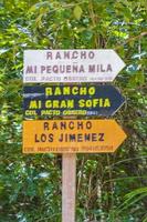 Puerto Aventuras Quintana Roo Mexico 2022 Ranches and farms information arrows welcome sing board Mexico. photo