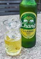 Don Mueang Bangkok Thailand 2018 Thai Chang beer bottle glass with ice cubes Bangkok Thailand. photo