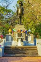 Don Mueang Bangkok Thailand 2018 Green historic human sculpture statue natural park in Bangkok Thailand. photo