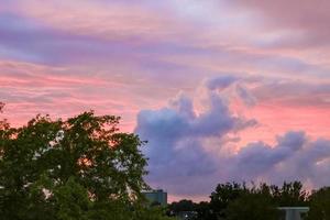 Amazing colorful pink violet blue and purple sunset sky panorama. photo