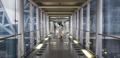 Corridors and running passengers Bangkok Suvarnabhumi Airport Thailand. photo