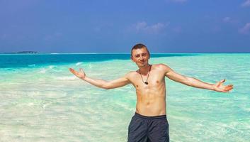 Russian tourist vacation on island Madivaru Finolhu Rasdhoo Atoll Maldives. photo