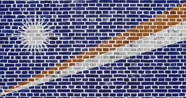 Flag of the Marshall Islands painted on a brick wall photo