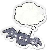 cartoon halloween bat and thought bubble as a distressed worn sticker vector