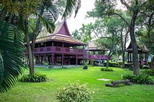 Thai traditional vintage house, Asia culture architecture with tropical garden.