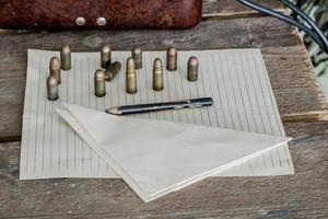 military background, ammunition on the table photo