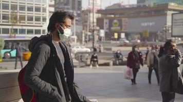 City life in pandemic conditions. Getting overwhelmed by the mask. Heavy human traffic. video