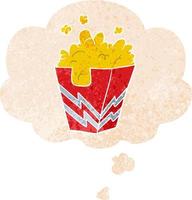 cartoon box of popcorn and thought bubble in retro textured style vector