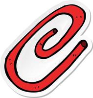 sticker of a cartoon red paperclip vector