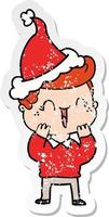 distressed sticker cartoon of a laughing boy wearing santa hat vector