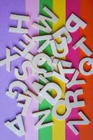 colored wooden letters background photo