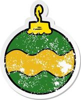 distressed sticker of a cartoon christmas bauble vector