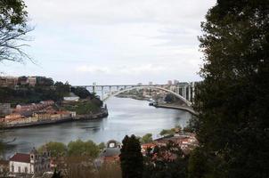 Beautiful view of Tagus river crossing Porto. Arrabida Bridge photo