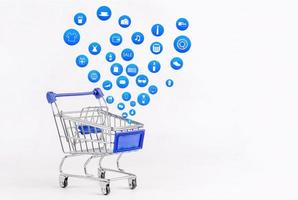 Shopping cart with Shopping icon on white background , Koncept shopping online photo