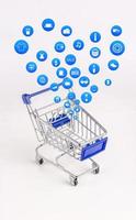 Shopping cart with Shopping icon on white background , Koncept shopping online photo