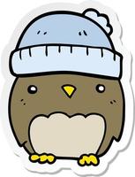 sticker of a cute cartoon owl in hat vector