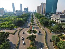 akarta - Indonesia - april 2, 2020 - Aerial view of traffic and office buildings - Jalana Benjamin Sueb. photo