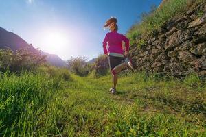 Girl runs in nature photo