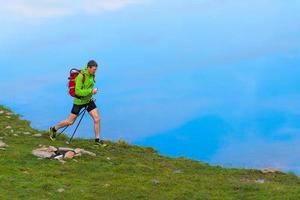 nordic walking on the lake shore photo