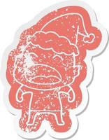 cartoon distressed sticker of a shouting bald man wearing santa hat vector