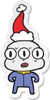 sticker cartoon of a three eyed alien wearing santa hat vector