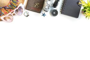 Travel accessories items on white background with copy space, Summer vacation concept photo