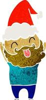 man with beard sticking out tongue wearing santa hat vector