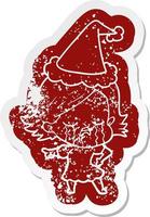 cartoon distressed sticker of a girl crying and pointing wearing santa hat vector