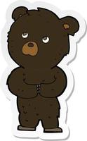 sticker of a cartoon black bear cub vector