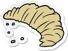 sticker of a cartoon croissant vector