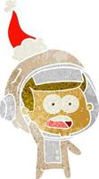 retro cartoon of a surprised astronaut wearing santa hat vector