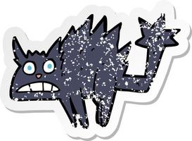 retro distressed sticker of a cartoon frightened black cat vector