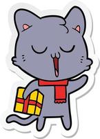 sticker of a cartoon cat with gift vector