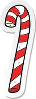 sticker of a cartoon candy cane vector