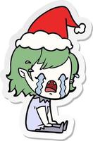 sticker cartoon of a crying vampire girl wearing santa hat vector