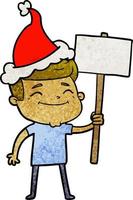 happy textured cartoon of a man with placard wearing santa hat vector