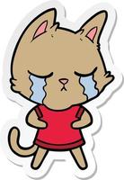 sticker of a crying cartoon cat vector