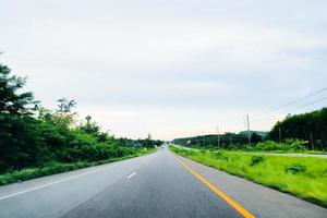 View of Road No. 4 in the south of Thailand in view of a speeding car. travel concept photo